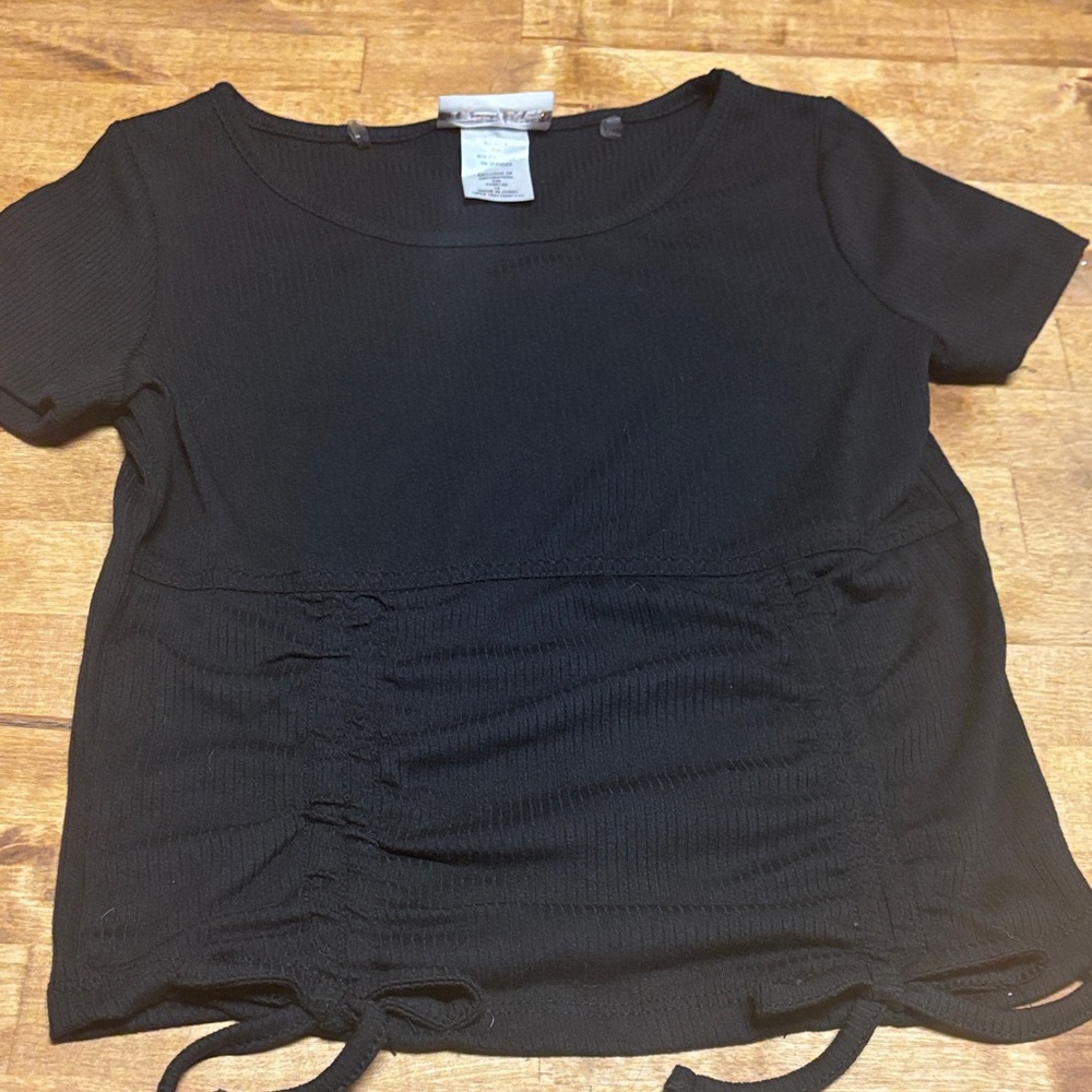 Girls size 12   Black Short Sleeve Top- fits more like a 10